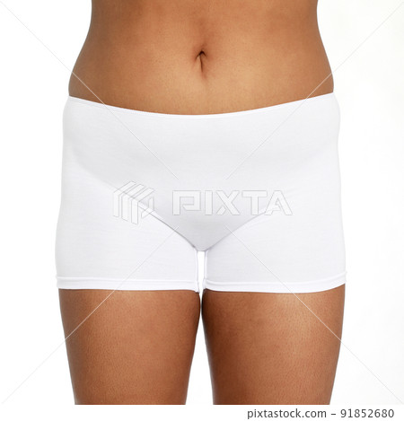 White woman panties. Fit women body Feeling beautiful. Attractive young woman in underwear smiling while standing against white background.posing in lingerie on a white background front view 91852680