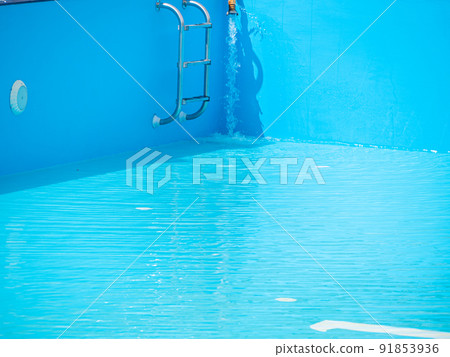 Pouring fresh water into swimming pool. Clear blue water refreshing disinfection purification, algae bacteria prevent. 91853936