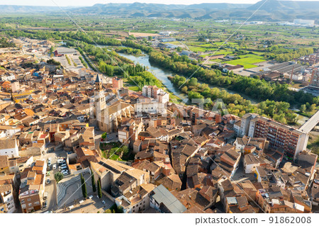 Aerial townscape of Fraga with view of Cinca River 91862008