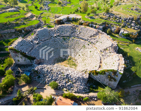 Drone view of ruined amphitheater of ancient Selge city, Turkey 91862084