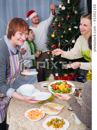 Family preparing for celebration of New Year 91862108