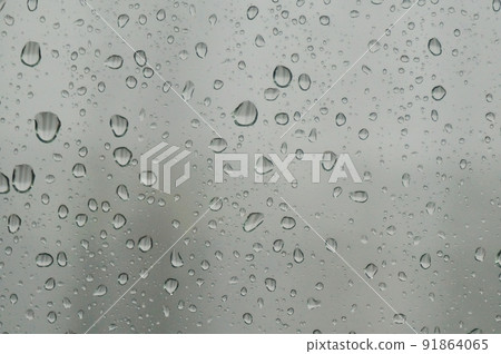 Raindrops and condensation through the windshield Raindrops and condensation through the windshield 91864065