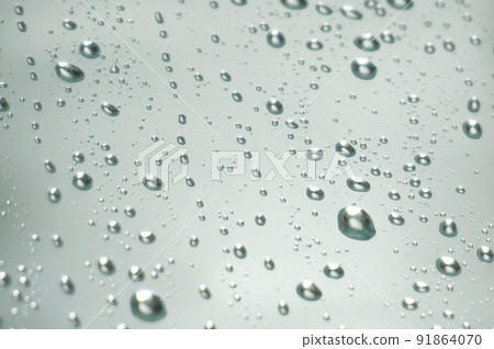 Raindrops and condensation through the windshield 91864070