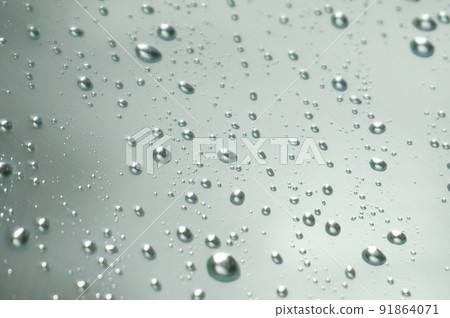 Raindrops and condensation through the windshield 91864071