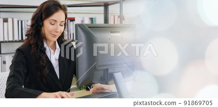 Business people wearing headset working in office broaden view 91869705