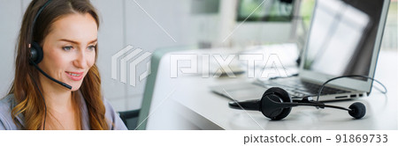 Business people wearing headset working in office in widen view 91869733