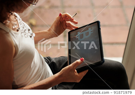 Stressed Woman Checking Bitcoin Price Index Stressed Woman Checking Bitcoin Price Index 91871979