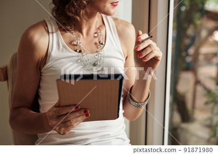 Smoking Woman with Digital Tablet Smoking Woman with Digital Tablet 91871980