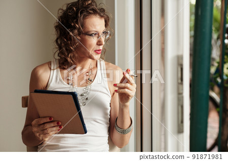 Smoking Mature Woman Smoking Mature Woman 91871981