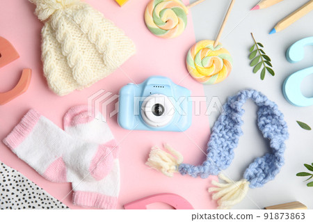Flat lay composition with toy camera on color background. Future photographer Flat lay composition with toy camera on color background. Future photographer 91873863