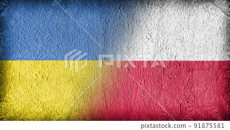 Ukrainian and Polish flag on concrete 91875581