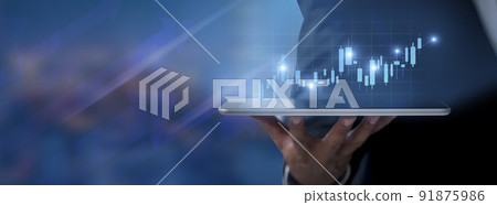 Hand of businessman holding tablet analysis stock market graph growth and increase of chart positive indicators. Hand holding tablet show stock chart on light gray background. copy space banner 91875986