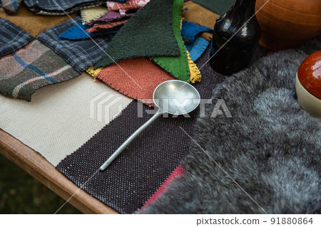 vintage silver spoon on black and white background, soup cutlery 91880864