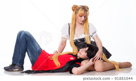 Portrait of a sexy woman with black hair on a red background. Portrait of a sexy woman with black hair on a red background. 91881044