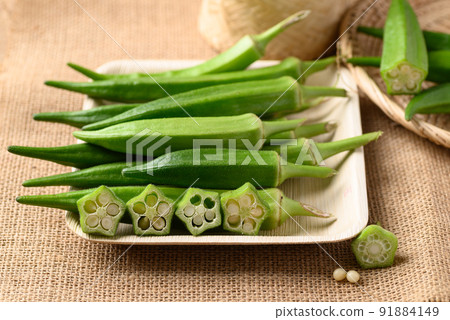 Fresh green okra, Organic vegetable, Asian food ingredients Fresh green okra, Organic vegetable, Asian food ingredients 91884149