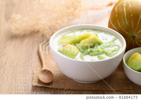 Thai dessert (Lod Chong), Rice flour jelly pandan flavor with Thai melon in coconut milk Thai dessert (Lod Chong), Rice flour jelly pandan flavor with Thai melon in coconut milk 91884173