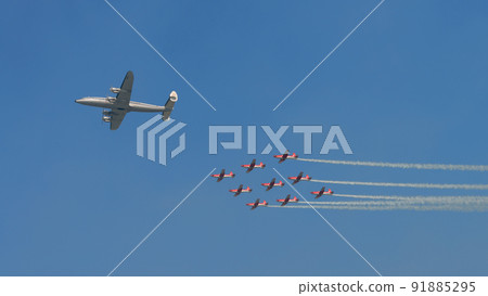 Lockheed L-1049G Super Constellation and Swiss Air Force Acrobat Team PC-7 TEAM 91885295
