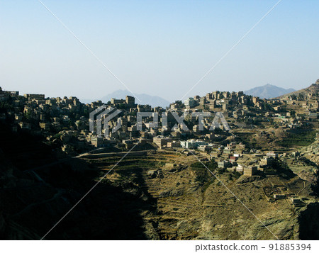 View to Manakha fortress and old city and terrace farming in Yemen View to Manakha fortress and old city and terrace farming in Yemen 91885394