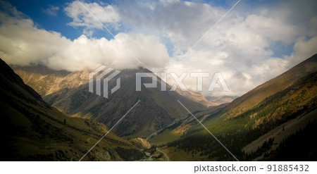 Panoramic view to Barskoon pass, river and gorge and Sarymoynak pass, Jeti-Oguz, Kyrgyzstan 91885432