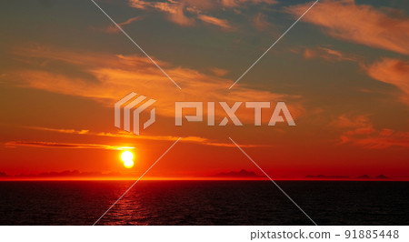 Sunset and sunrise over the sea and Lofoten archipelago from the Moskenes - Bodo ferry, Norway 91885448