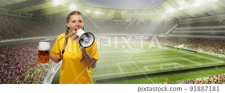 Excited woman holding beer mug and supports favorite team over crowded stadium. Soccer fans, competition, sport, oktoberfest concept 91887181
