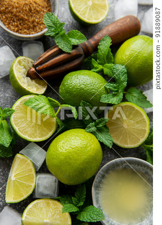 Lime, mint and ice on a dark background. Lime, mint and ice on a dark background. 91889087