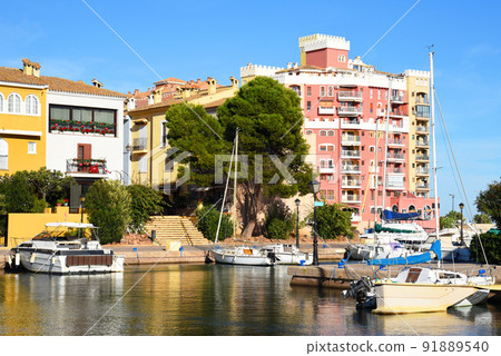 Yachts and motor boats in marina Port Saplaya, Valencia, Alboraya, Spain. 91889540