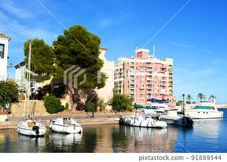 Yachts and motor boats in marina Port Saplaya, Valencia, Alboraya, Spain. 91889544