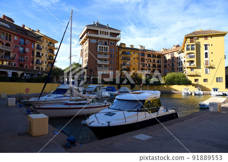 Yachts and motor boats in marina Port Saplaya, Valencia, Alboraya, Spain. 91889553