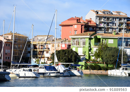 Yachts and motor boats in marina Port Saplaya, Valencia, Alboraya, Spain. 91889563
