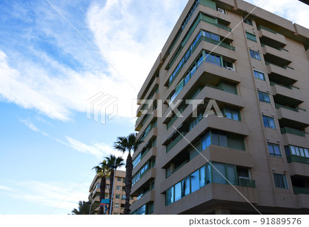 Facade of a building. Residential building with balconies. Facade of a building. Residential building with balconies. 91889576