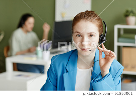Call centre operator in headphones 91893061