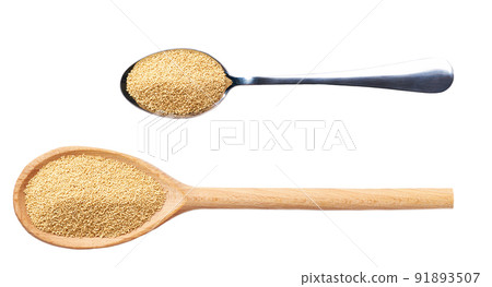 wooden and metal spoon with amaranth isolated on white background top view. 91893507