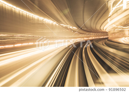 Motion blurred of train moving inside tunnel with 91896502