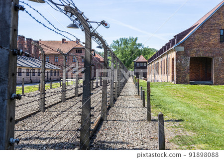 Barbed wire around the Auschwitz-Birkenau concentration camp. Oswiecim, Poland, 16 May 2022 Barbed wire around the Auschwitz-Birkenau concentration camp. Oswiecim, Poland, 16 May 2022 91898088