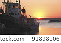 Old abandoned fishing boat at sunset 91898106