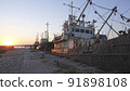 Old abandoned fishing boat at sunset 91898108