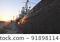 Old abandoned fishing boat at sunset 91898114