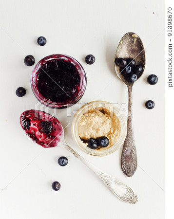 Blueberry jam and peanut butter 91898670
