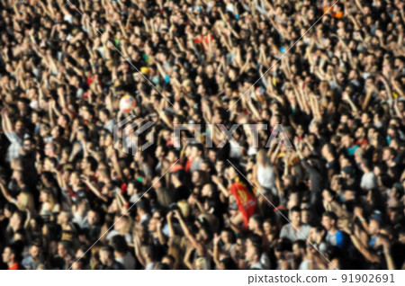 Blurred crowd of people partying Blurred crowd of people partying 91902691