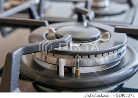 New kitchen stove with gas hob, close up. Modern kitchen appliance 91905375
