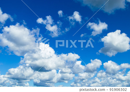 Beautiful summer blue sky. Fluffy white cumulus clouds. Beautiful summer blue sky. Fluffy white cumulus clouds. 91906302