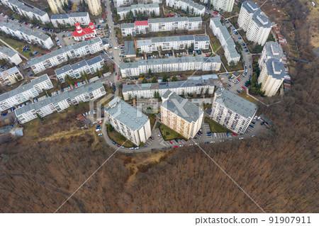 Drone view of urban environment, city taking place of nature Drone view of urban environment, city taking place of nature 91907911