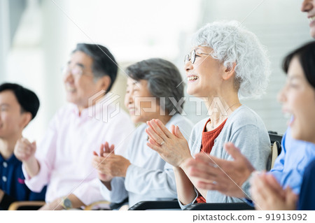 Elderly housing with care users watching the offerings Senior image Caregiver 91913092