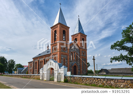 Old ancient catholic church of Saints Simeon and Tadeusz in Lazduny, Grodno region, Belarus. Old ancient catholic church of Saints Simeon and Tadeusz in Lazduny, Grodno region, Belarus. 91913291