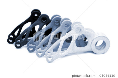 Models printed on 3D printer isolated on white background. Objects details printed on 3D printer from plastic close-up. Prototypes of shapes made by 3d printer. Concept new modern printing technology 91914330