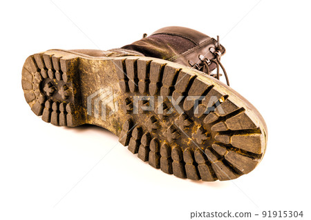 dirty military style light ankle boot isolated on white background dirty military style light ankle boot isolated on white background 91915304
