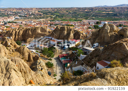 Neighborhood with troglodyte cave houses, Guadix, Spain Neighborhood with troglodyte cave houses, Guadix, Spain 91922139