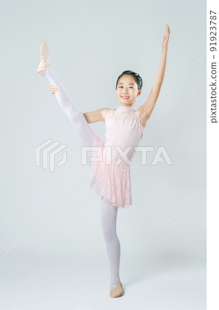 Girl in ballet costume Ballerina Y-shaped balance Girl in ballet costume Ballerina Y-shaped balance 91923787