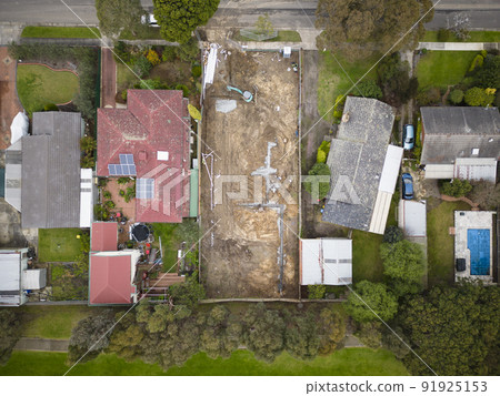 Aerial photo of vacant residential land under development in a suburb in Australia 91925153